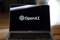 OpenAI logo on laptop