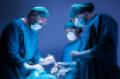 concentrated professional surgical doctor team operating surgery a patient