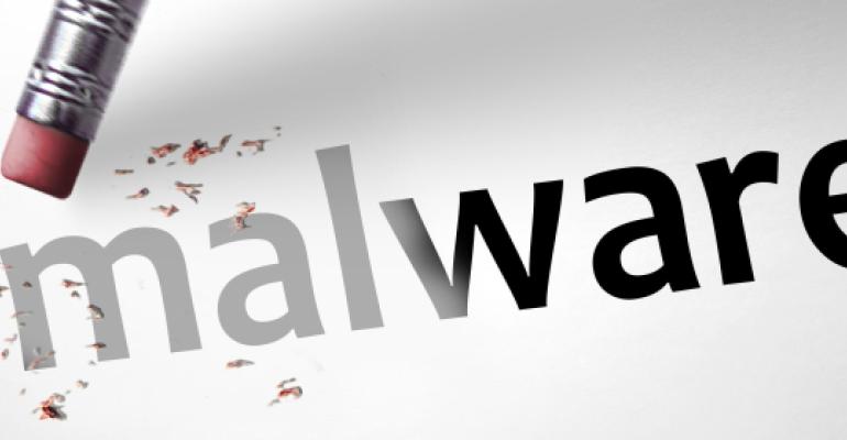 pencil eraser erasing the word Malware
