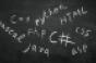 programming languages written on a chalkboard