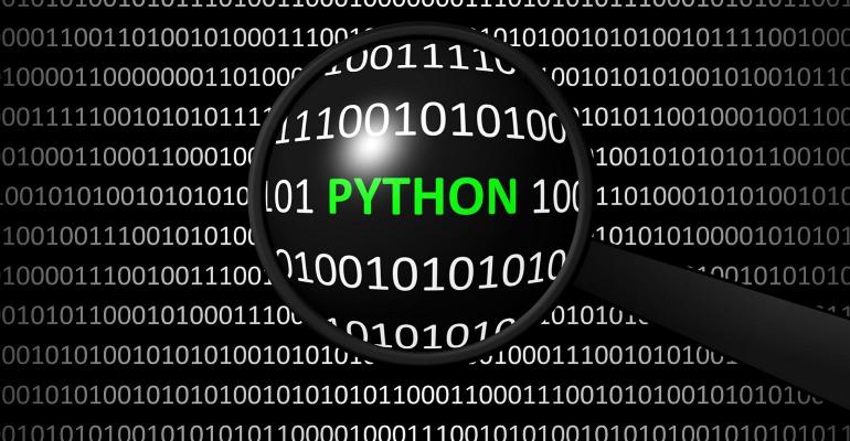 magnifying glass looking at the word PYTHON amid code