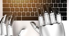 robot typing on a laptop keyboard