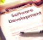 "software development" written on a clipboard